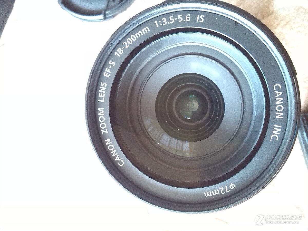 新手在刚购入70D套机18-200，准备购卡、滤镜、遮光罩之类的配件，望高人指点为！