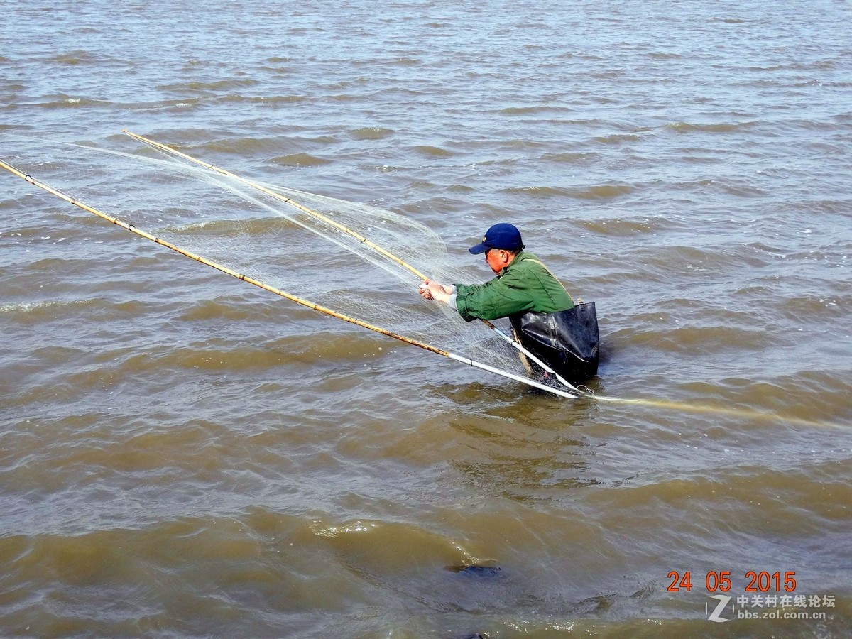松花江边网鱼
