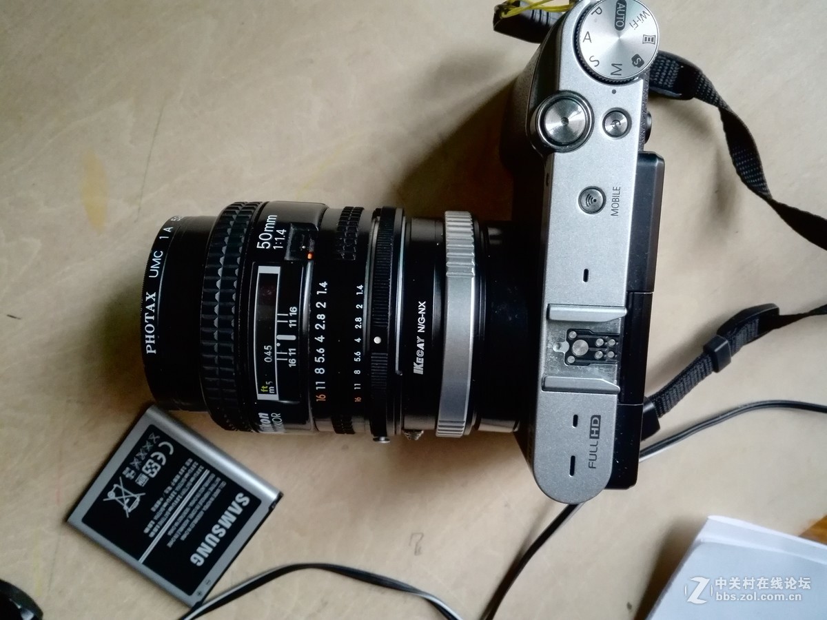 星空体育平台NX3000转接腾龙18-200镜头