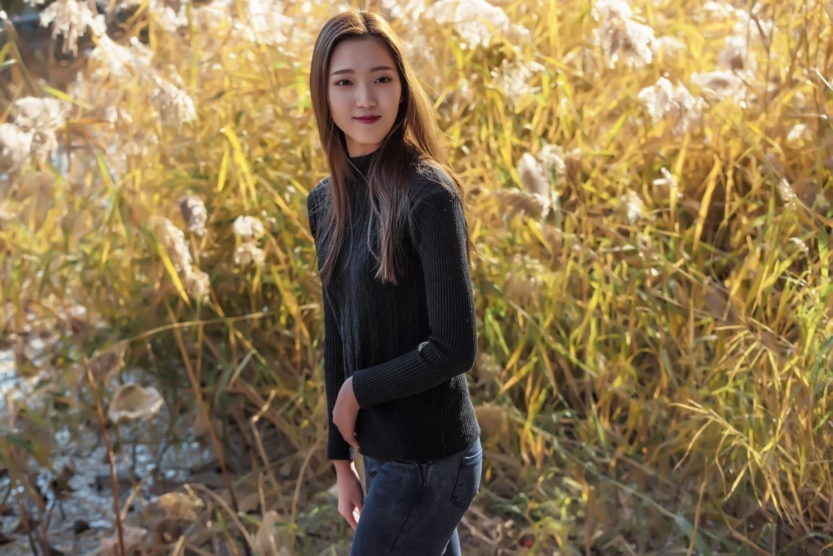 腾龙70210抓拍芦荡佳人