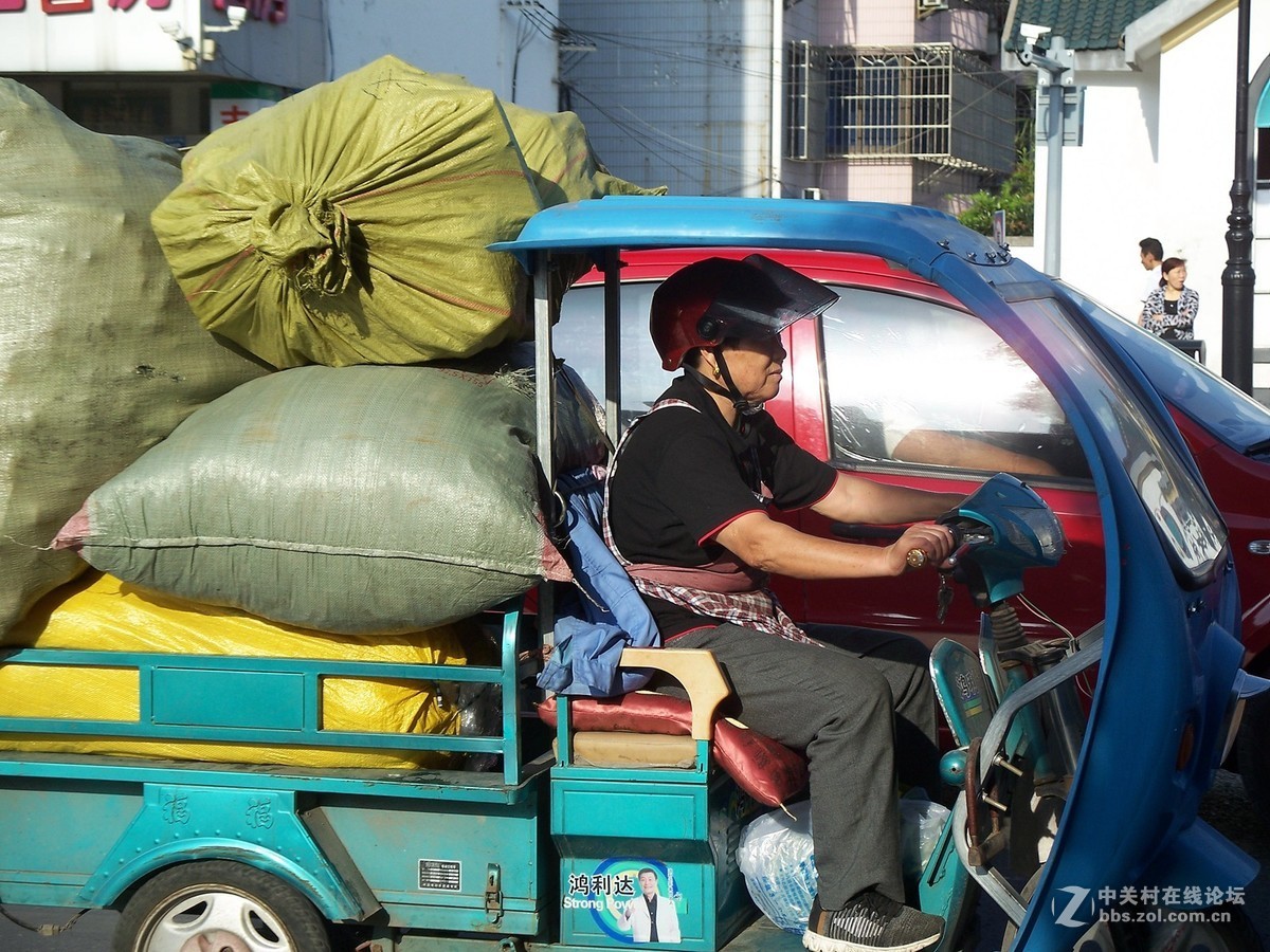 相机是一种情怀，手机是记录：街上的人们--骑行者