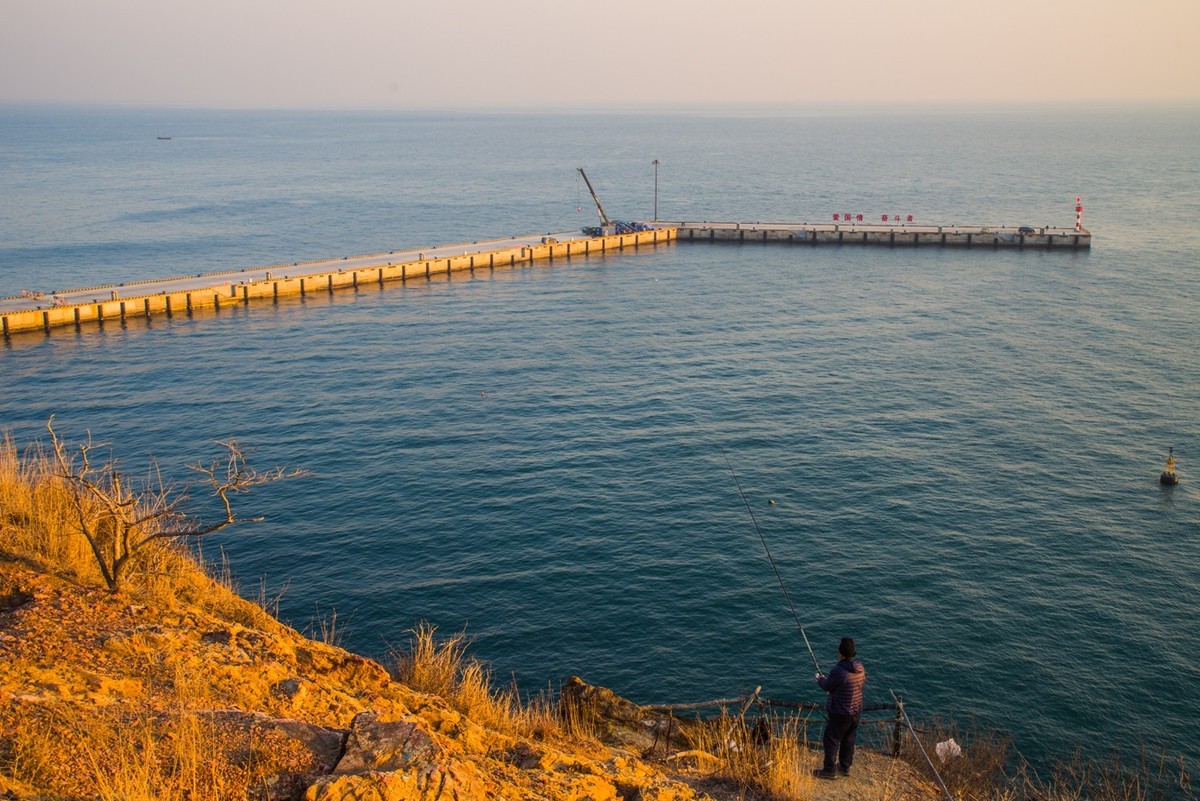 半壁落海日（北大桥落日）
