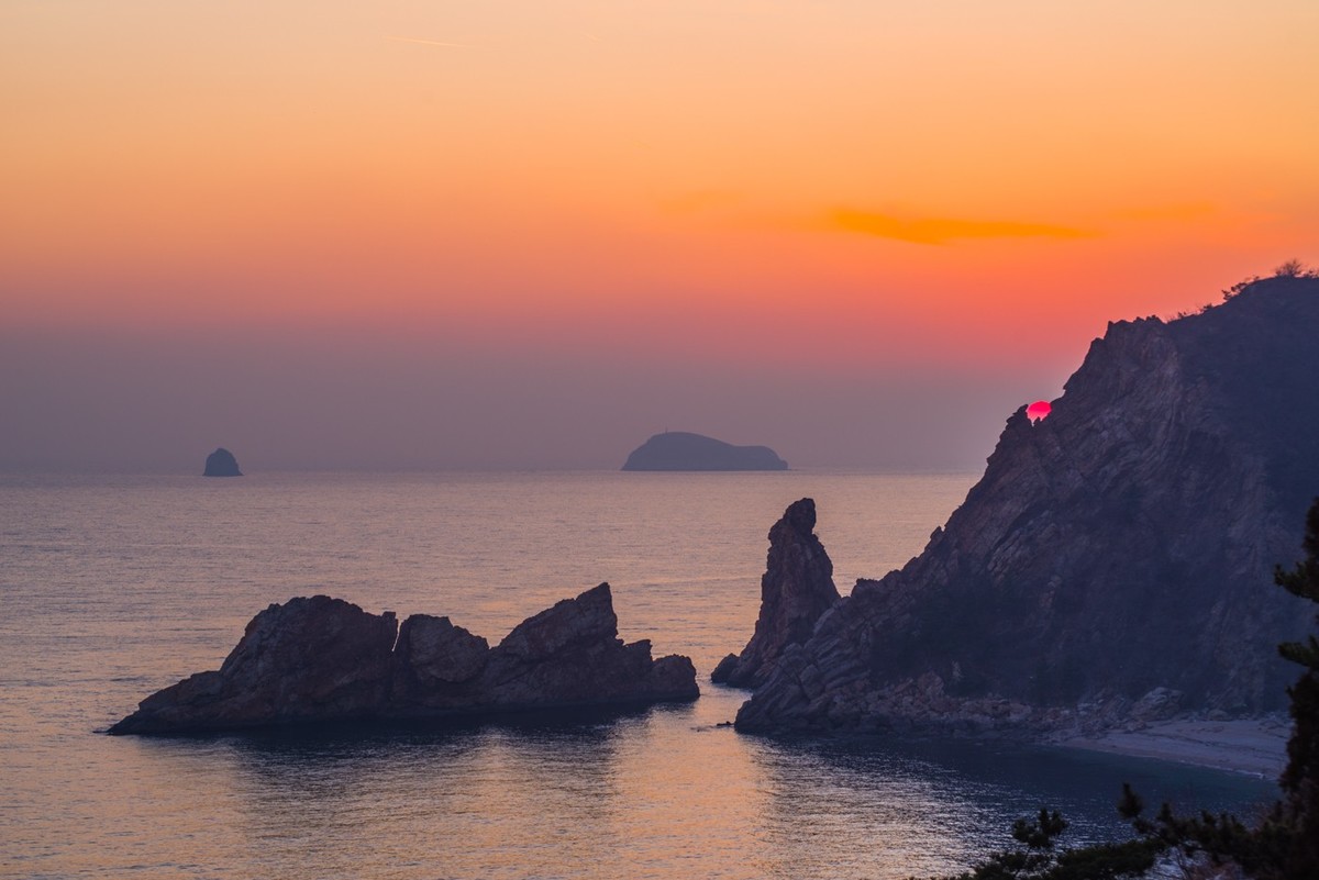 半壁落海日（北大桥落日）