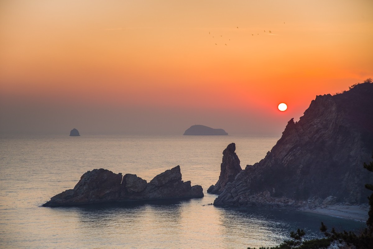 半壁落海日（北大桥落日）