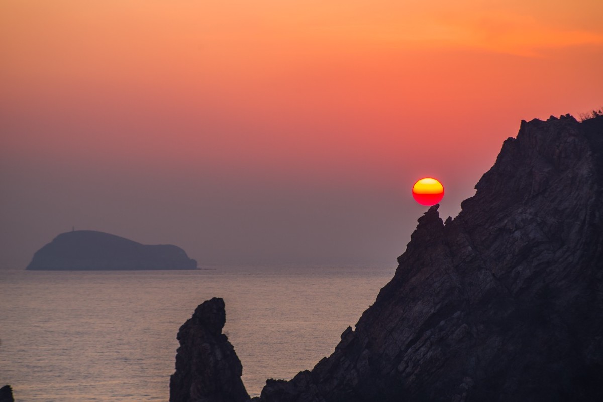 半壁落海日（北大桥落日）