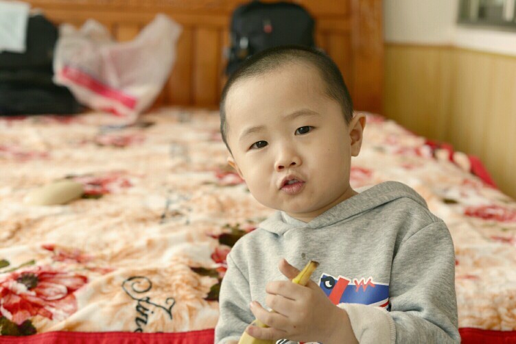 腾龙a012拍自家娃