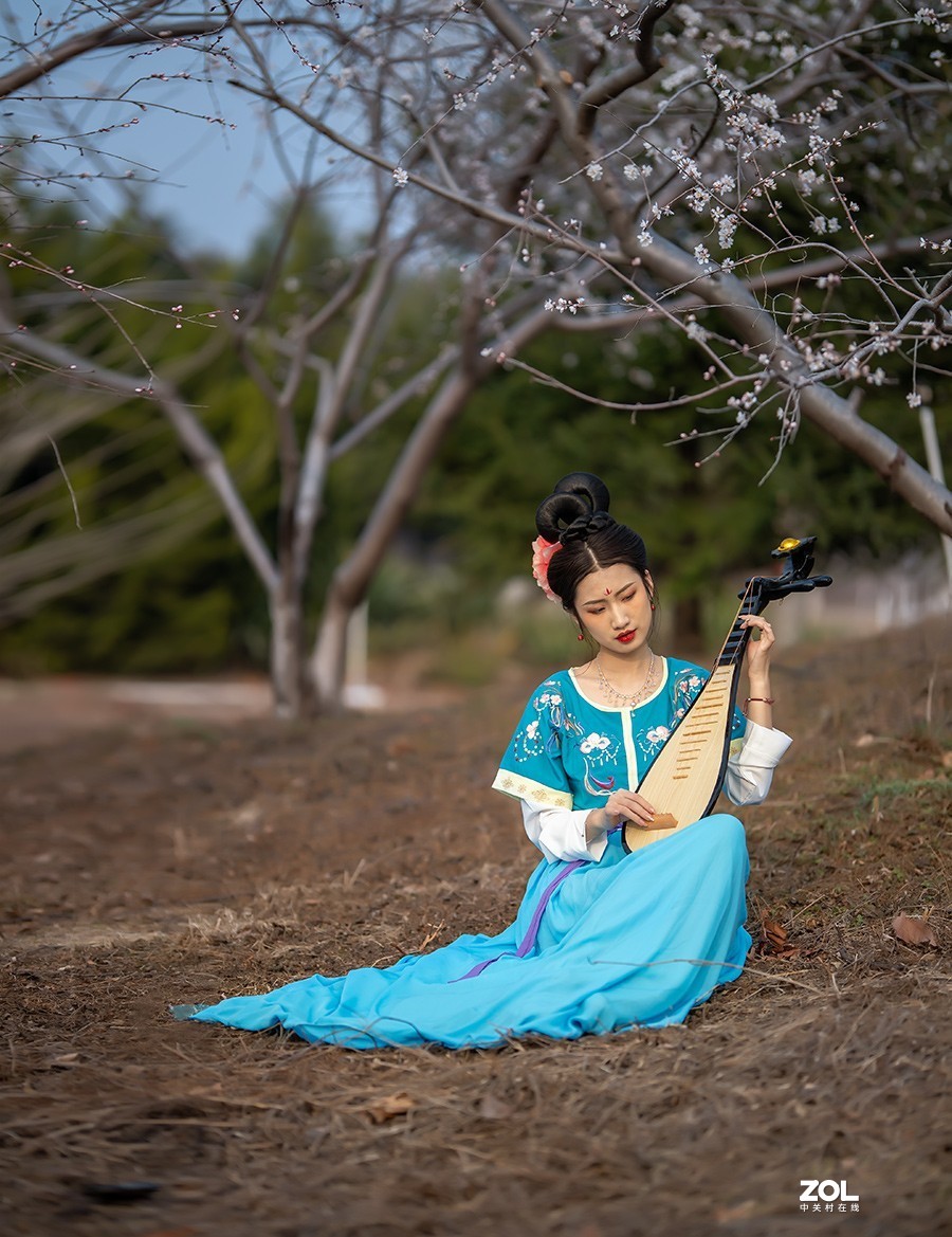 挑花依旧笑春风  【学拍环境人像】