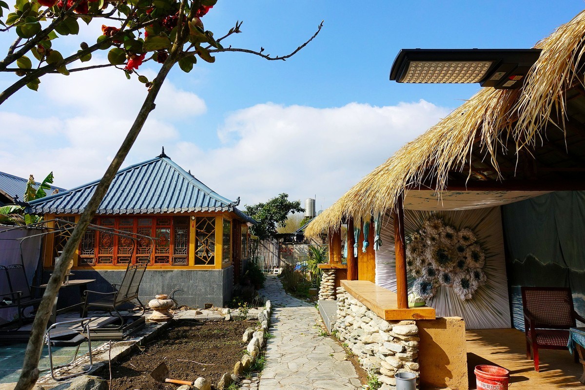 “龙下登”民族村扫描