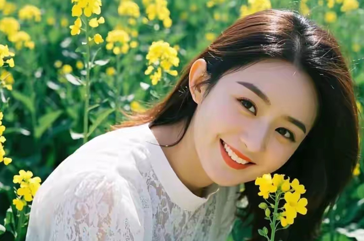 油菜花香映美女