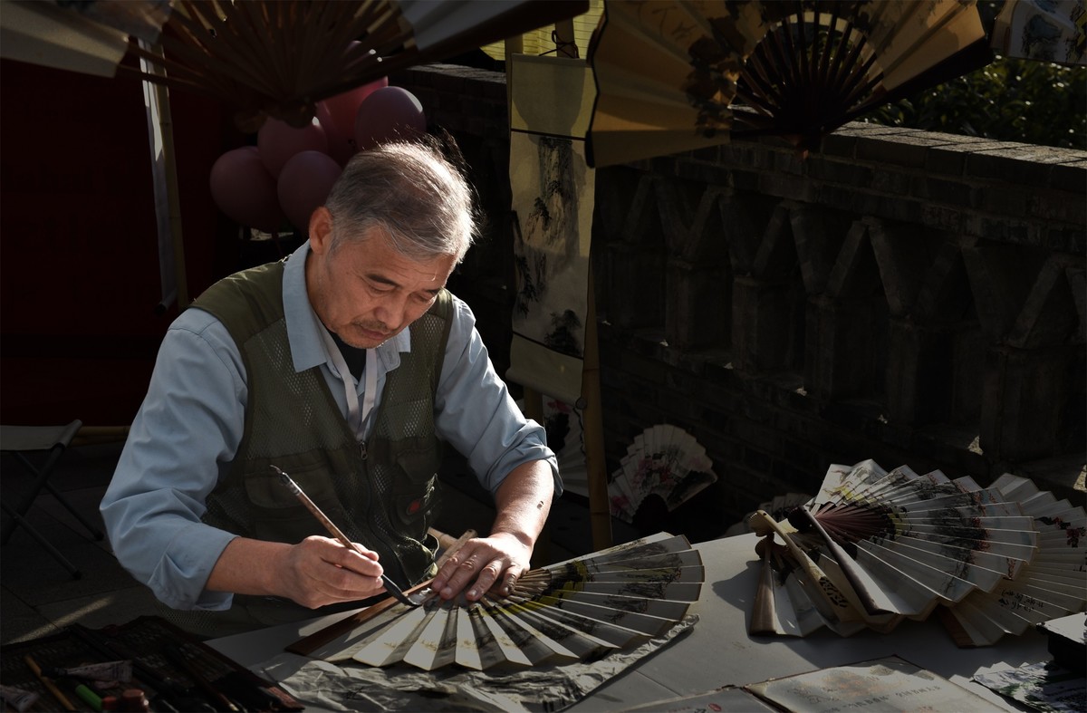 现场画扇的名家