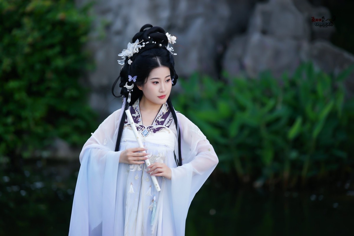 【紫灵羽衣】---似海