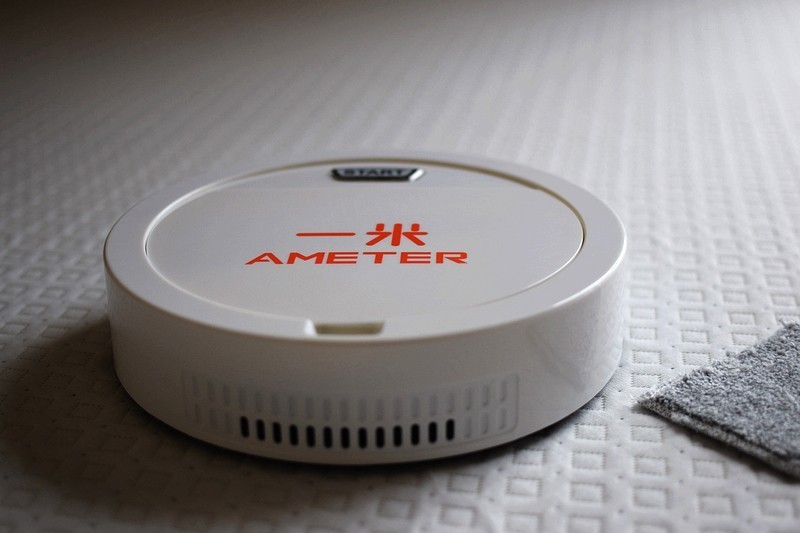 快去干活吧 勤劳的一米T115智能扫地机器人