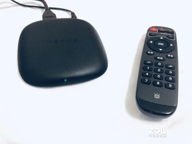 入了新品电视盒子---泰捷GT，外观看起来好小巧