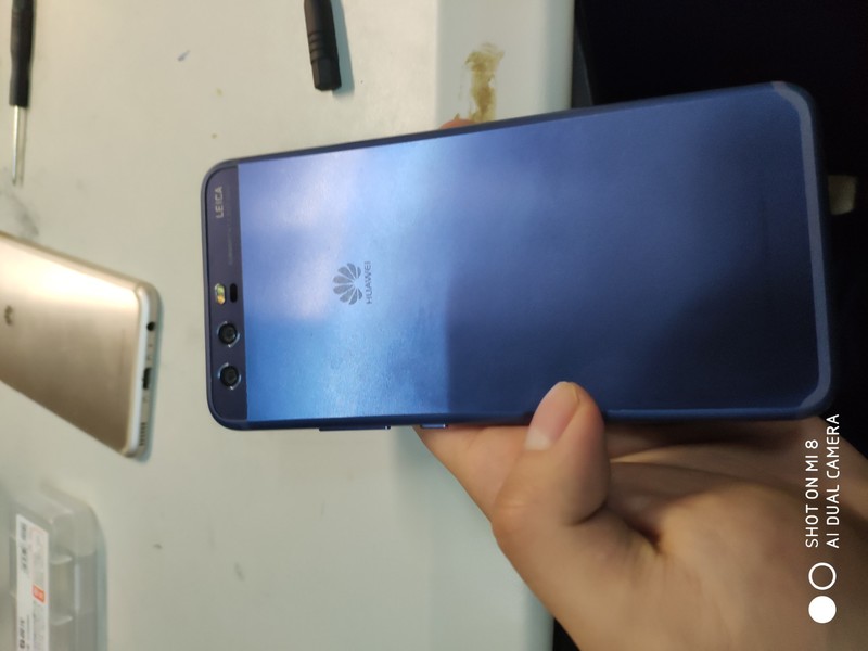 P10用了一年多了 今天换了个后盖