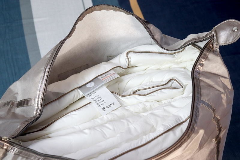 怎样挑选一条好的羽绒被？网易严选95%白鹅绒，保暖不闷睡得香