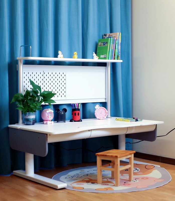 陪伴孩子健康成长 酷可立智能电动升降学习桌