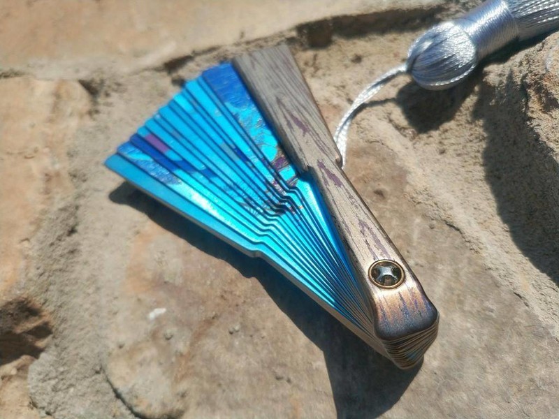 古韵今风，钛艺流芳：FEGVE费戈 “灵鹤” 全钛彩画扇