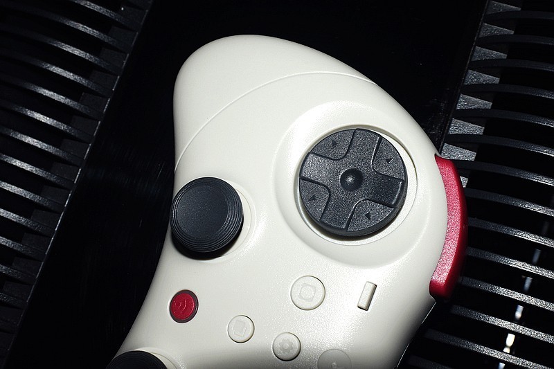 游戏爱好者的全新选择 谷粒精灵2Pro无线蓝牙复古游戏手柄