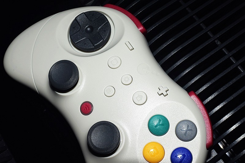 游戏爱好者的全新选择 谷粒精灵2Pro无线蓝牙复古游戏手柄