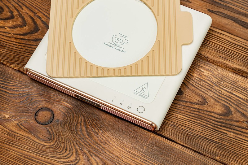 科技如何改变生活？看似不起眼的暖杯垫，寒冷冬日暖胃又暖心