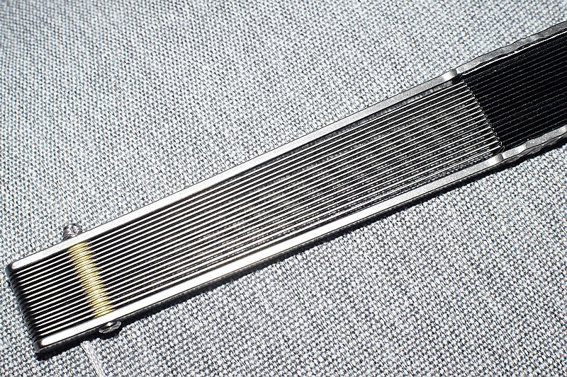 工匠精神.铮铮钛骨 费戈陨石坑马牙钛扇